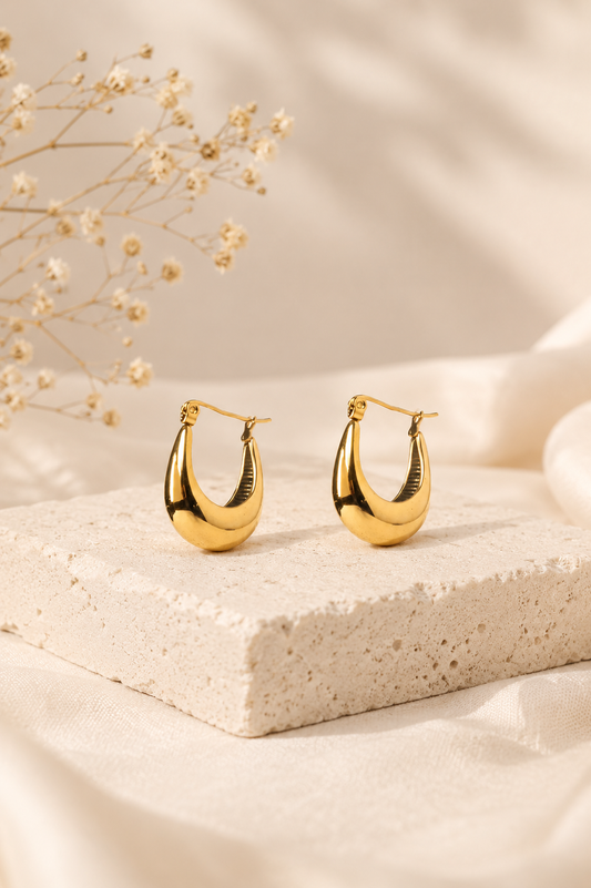 Aros ovalados pequeños dorados acero inoxidable Naiala Moda